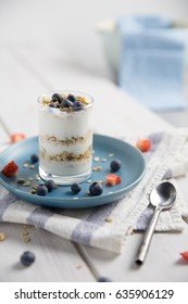 Fresh Homemade Granola Yogurt Parfait With Blueberries And Strawberries