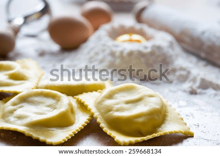 Similar – Image, Stock Photo Homemade tortelloni on a colourful wooden table