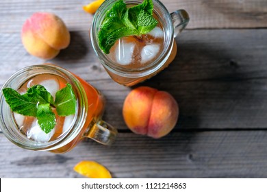 Fresh Homemade Peach Sweet Tea With Mint