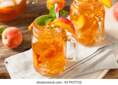 Fresh Homemade Peach Sweet Tea With Mint