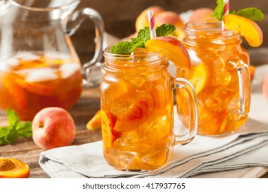 Fresh Homemade Peach Sweet Tea With Mint