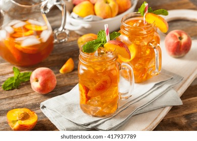 Fresh Homemade Peach Sweet Tea With Mint