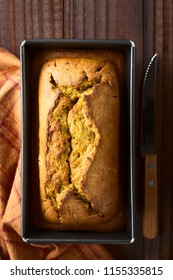 Fresh Homemade Pumpkin Bread In Pan, Photographed Overhead (Selective Focus, Focus On The Top Of The Bread)