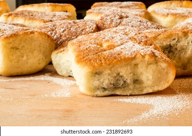 Fresh Homemade Typical Czech Desert ( Buchty) On The Wooden Table With Suger Icing