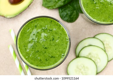 Fresh Homemade Vegan Green Smoothie Made Of Spinach, Cucumber, Avocado And Lemon Juice, Photographed Overhead (Selective Focus, Focus On The Drink)