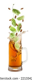 Fresh Hops Flowers With Leaves And Wheat Grains Falling Into Glass Mug Of Beer On White Background