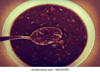 Fresh Hot Black Bean Soup In White Bowl On Kitchen Table