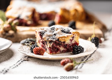 Fresh and hot blackberry cake made of blackberries, flour and eggs. Vegan fruit sponge cake. - Powered by Shutterstock