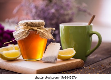 Fresh Hot Cup Of Tea With Honey And Lemon Background
