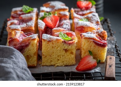 Fresh and hot strawberry cake made of strawberries and mint. Vegan fruit sponge cake.