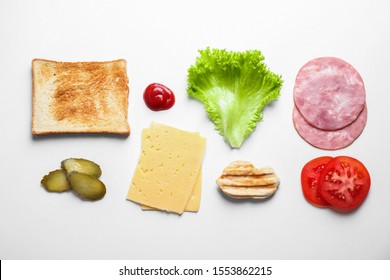 Fresh Ingredients For Tasty Sandwich On White Background, Top View