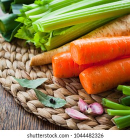 Fresh ingredients for veggie stock : carrots, celery, leeks, onion, carrots, parsnip, parsley, garlic, peppercorns, chili. Spring and summer products for soup seasonal vegetables, best from farm shop.