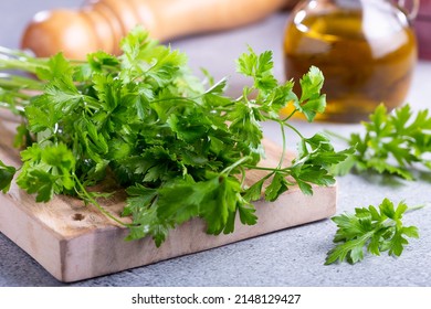 Fresh italian parsley on the table. Green parsley. - Shutterstock ID 2148129427
