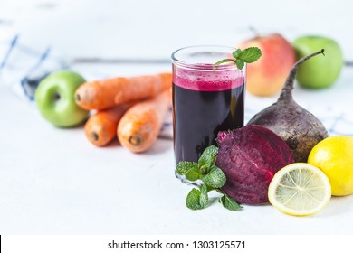 fresh juice from homemade vegetables. Beet smoothie. Detox, vegetarianism On a bright summer background - Powered by Shutterstock