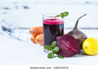 fresh juice from homemade vegetables. Beet smoothie. Detox, vegetarianism On a bright summer background - Powered by Shutterstock