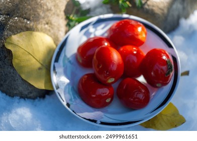 Fresh and juicy barrel tomatoes. Ideal for snacking. Salted tomatoes add flavor to traditional tomatoes. Refreshing, vitamin-rich healthy snack options. Vegetarian and delicious supplement - Powered by Shutterstock