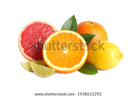 Fresh juicy citrus fruits with green leaves on white background