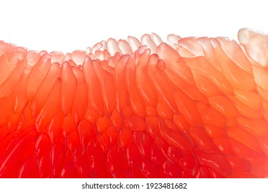 Fresh juicy grapefruit pulp on white background. Piece of red grapefruit macro close up. Citrus fruit texture wallpaper - Shutterstock ID 1923481682