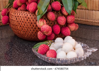 Fresh juicy lychee fruit on a glass plate. Organic leechee sweet fruit. Organic fruit concept. Exotic tropical litschi berry. Peeled lychee fruit. Selective focus.