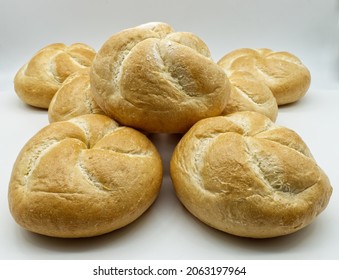 Fresh Kaiser rolls baked bread. Kaiser is a type of round, hard, and crunchy bread originally from Austria, often used to make sandwiches. 