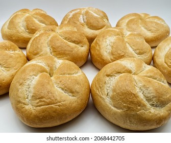 Fresh Kaiser rolls baked bread. Kaiser is a type of round, hard, and crunchy bread originally from Austria.