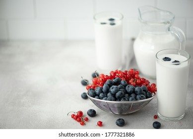 Fresh Kefir In A Jug With Berries