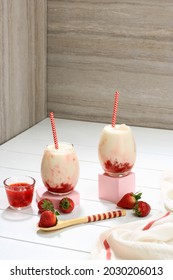 Fresh Korean Strawberry Milk with Homemade Strawberry Compote Sauce on White Background, Copy Space for Text, Copy Space for Text