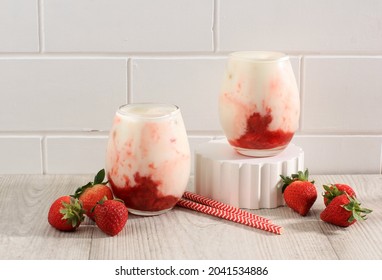 Fresh Korean Strawberry Milk with Homemade Strawberry Compote Sauce on White Background, Copy Space for Text, Copy Space for Text