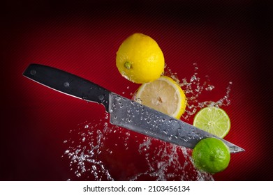 A Fresh Lemon Cut With A Knife In Drops Of Water Highlighted On A Bright Red Background, The Concept Of A Healthy Diet Or Diet, A Summer Drink Or A Refreshing Drink. High-quality Photography