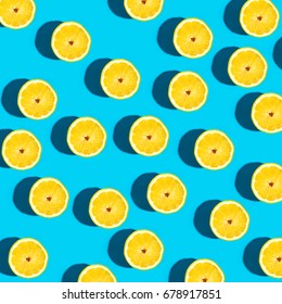 Fresh Lemon Pattern On A Vivid Blue Background Flat Lay