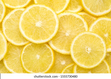 Fresh lemon slices pattern background, close up - Powered by Shutterstock