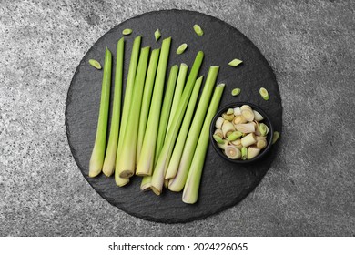 Fresh Lemongrass Stalks On Grey Table, Top View