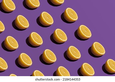 Fresh lemons, creative pattern on purple background. Summer fruit. - Powered by Shutterstock - Get 15% off with code: PIKWIZARD15