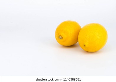Fresh lemons on white background. Selective focus. - Shutterstock ID 1140389681