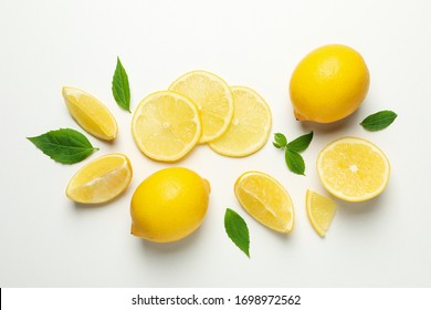 Fresh lemons on white background, top view. Ripe fruit