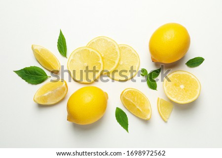 Fresh lemons on white background, top view. Ripe fruit