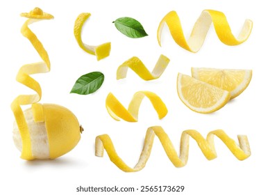 Fresh lemons, peels and green leaves on white background