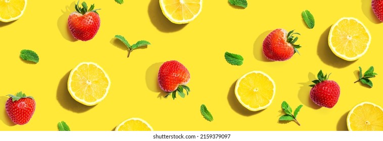 Fresh Lemons And Strawberries With Mints Overhead View - Flat Lay