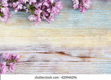 204,978 Purple Flowers On Wooden Background Images, Stock Photos & Vectors  | Shutterstock