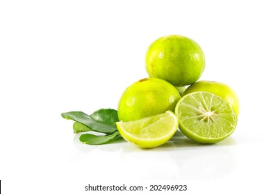 fresh limes on white background