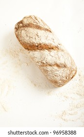 Fresh Loaf Of Bread With Flour, Seen From Above