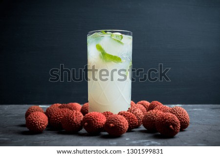 Fresh lychee mojito on the rustic background. Selective focus. Shallow depth of field.
