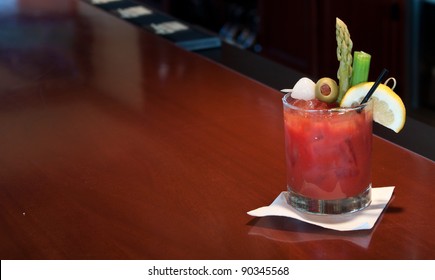 Fresh Made Bloody Mary At The Bar Garnished With Olives, Onions, Asparagus And Celery