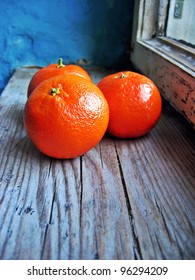 Fresh Mandarins Oranges On An Old Retro Window Sill