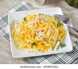 Fresh Mango Jicama Salad With Cabbage On A Plate