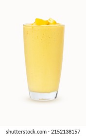Fresh Mango ripe organic yellow smoothie honey mix in glass. Perfect for summer drink. Healthy food. There is vitamin C. Garnish isolated on white background. Ripe mangoes are popular all over world.  - Shutterstock ID 2152138157