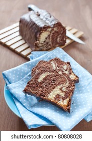 fresh marble cake sliced on a plate