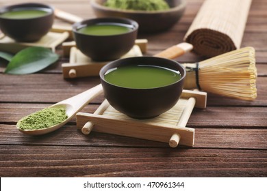 Fresh matcha tea on wooden background