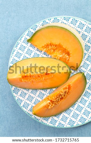 Similar – Image, Stock Photo Melon slices on plate