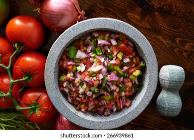 Fresh Mexican Pico De Gallo Salsa In Stone Molcajete Shot Top Down